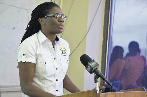 Projects Abroad Jamaica Country Director Dr Bridgette Barrett speaking about the Belle Haven Centre which is to be built in Central Manchester for children and women living with HIV/AIDS at a Rotaract Club meeting at the Northern Caribbean University last Wednesday. (PHOTO: PROJECTS ABROAD)