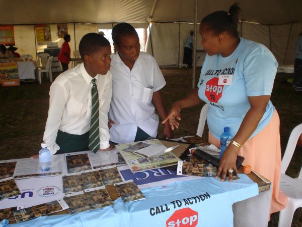  Aid workers explain the relationship between HIV and tuberculosis in South Africa USAID U.S. Agency for International Development Flickr Creative Commons