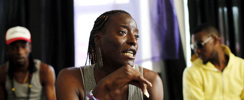  Inkera Jordan, who is HIV positive since 1995 and a peer educator with the AIDS Service Center of New York City socializes with members of the group Sexy with A Goal (SWAG) at ASC/NYC's Lower East Side Peer Outreach Center, July 7, 2012 in New York. Photo by Mike Segar/Reuters